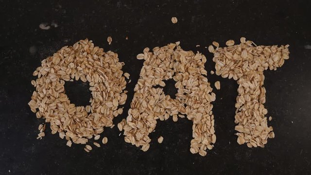 Stop motion animation with oats forming the word OAT.