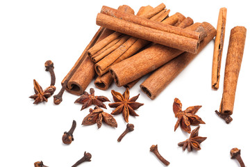 Cinnamon sticks and star anise isolated on white background