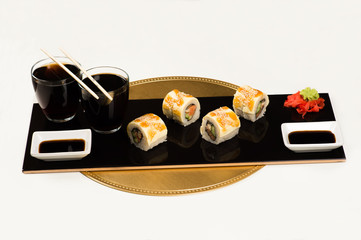 delicious sushi rolls on dish