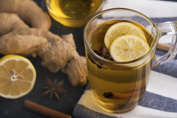 Hot drink with honey, lemon and ginger for cough remedy. Autumn hot drink