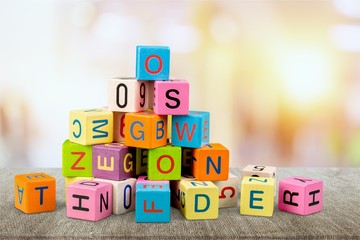 Colorful cubes on background. Educational concept.