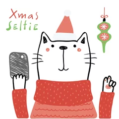  Hand drawn vector illustration of a cute funny cat in a Santa hat, with a smart phone, text Xmas selfie. Isolated objects on white background. Line drawing. Design concept for Christmas card, invite. © Maria Skrigan