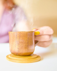 Woman drink coffee in bed