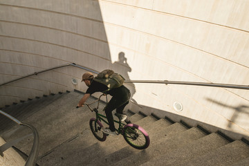 Fototapeta na wymiar BMX rider on the street of a city