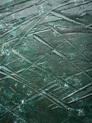 Dark green acrylic painted wooden background with rough texture