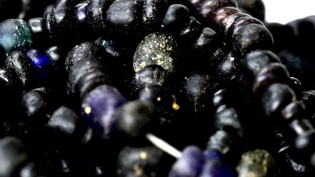 Close up of Ancient rare black Tradewind glass Beads