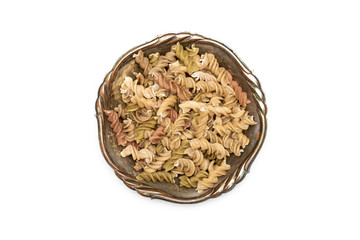 Raw pasta fusilli isolated on white