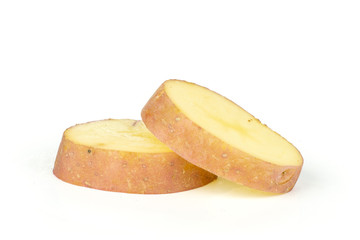 Group of two slices of fresh red potato francelina variety isolated on white background