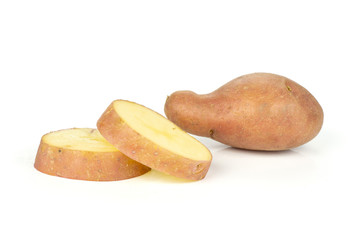Group of one whole two slices of fresh red potato francelina variety isolated on white background
