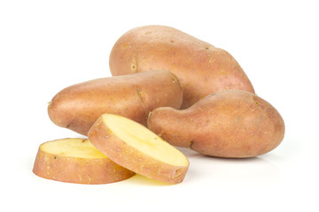 Group of three whole two slices of fresh red potato francelina variety isolated on white background