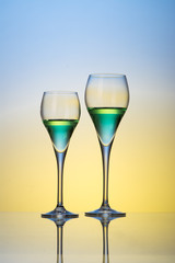 two glasses with cocktails