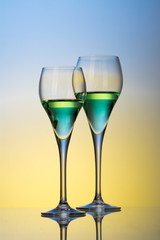 two glasses with cocktails