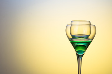 two glasses with cocktails 