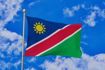 Fototapeta na wymiar Namibia national flag waving isolated in the blue cloudy sky realistic 3d illustration