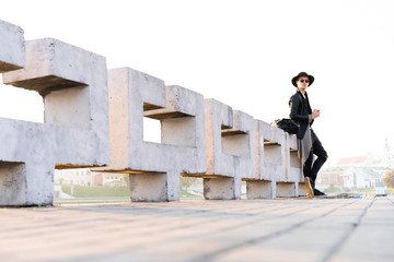 Fashion outdoor photo of stylish handsome man with sunglasses