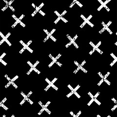 Obraz premium Vector seamless pattern. Abstract background with brush strokes. Monochrome hand drawn print. Hipster texture with crosses or pluses. Trendy graphic design