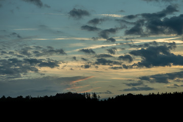 Romantic sunset with black silhouette in the foreground