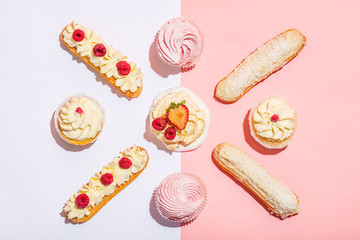 Bunch of sweet cakes in a pastel geometrical composition.