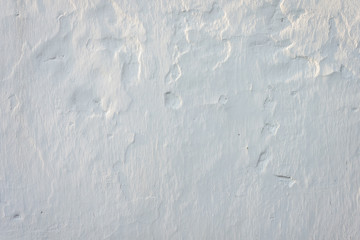The texture of a plastered white wall. Close-up. Background