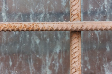 Painted lattice on the background of dirty windows