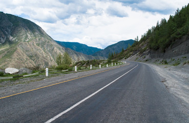 Serpentine asphalt road in the mountains