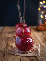 Close-up of candy apples on wooden background