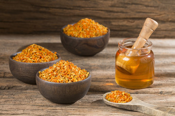 Honey glass jar and pollen - Top view