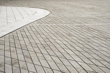 Gray tiled floor background. Old town square