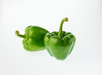 green pepper on white background.