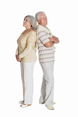 Fototapeta na wymiar Portrait of senior couple posing on white background