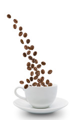 coffee beans falling into cup