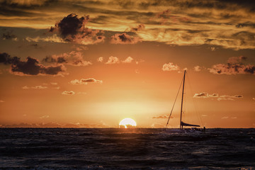 Sunset in Leba with boat, Baltic sea, Poland - obrazy, fototapety, plakaty