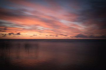Mystic sunset with people silhouete, Baltic sea,