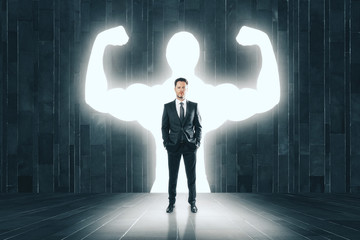 Businessman with muscly arms