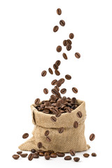 coffee beans falling into sack bag