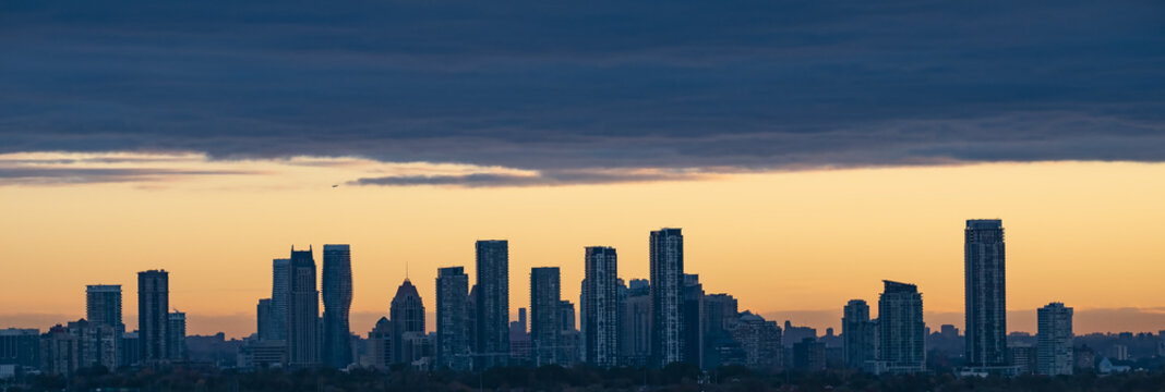 Silhouette of Mississauga Cityscape During Sunrise