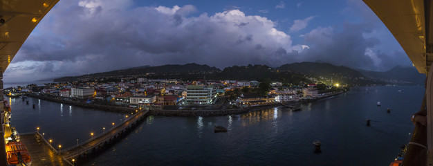Panoramic picture of the city of Roseau on Dominca island taken from a cruise ship during dawn