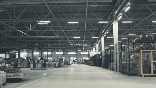 Slightly blurred industrial background. Typical plant, factory, industrial storage, warehouse interior. Selective focus. Industrial background.