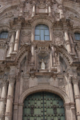 Fototapeta na wymiar Close up of old catholic church facade in Cuzco Peru