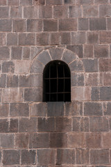 Close up of old window of a house facade in Cuzco Peru. Historical downtown