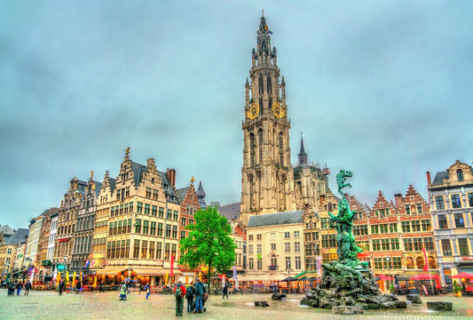 The Cathedral of Our Lady and the Silvius Brabo Fountain on the Grote Markt Square in Antwerp, Belgium