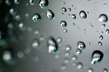 Macro raindrops water on glass