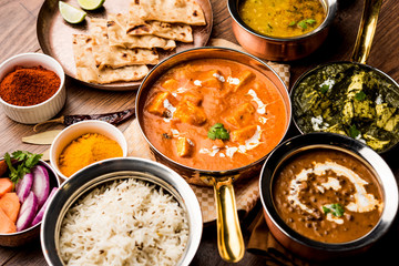 Indian Lunch / Dinner main course food in group includes Paneer Butter Masala, Dal Makhani, Palak...