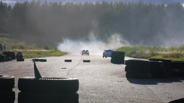 Cars going through smoke on the F-Race 200.