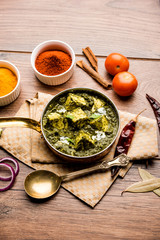 Palak Paneer Curry made up of spinach and cottage cheese served in a bowl or pan with roti or rice