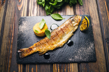 fried fish with basil