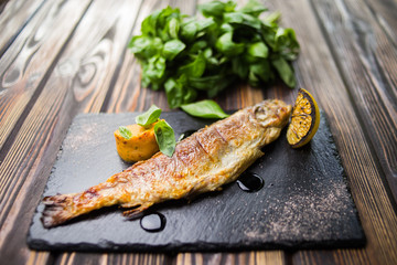fried fish with basil