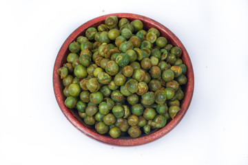 green spicy peas isolated on white background. 