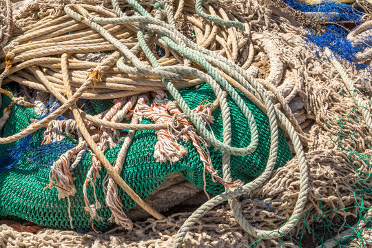 Many fishing nets laid outdoor, drying in the sun. Traditional craft of spain Mallorca, Spain, Western Europe.