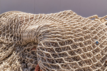 Close up view of fishing net. Fishing net background. Fishnet close up